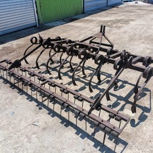 Cultivador agrícola robusto de 15 brazos con rastrillo